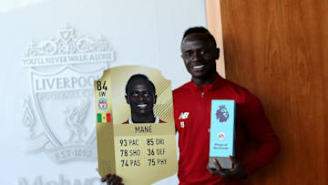 LIVERPOOL, ENGLAND - SEPTEMBER 08: Sadio Mane of Liverpool poses with the EA SPORTS Player of the Month Award for August 2017 on September 8, 2017 in Liverpool, England. (Photo by Jan Kruger/Getty Images for Premier League)