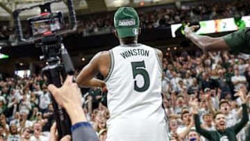 Michigan State's Cassius Winston celebrates after beating Ohio State on Sunday, March 8, 2020, at the Breslin Center in East Lansing. The Spartans won a share of the Big Ten Championship.200308 Msu Osu 252a