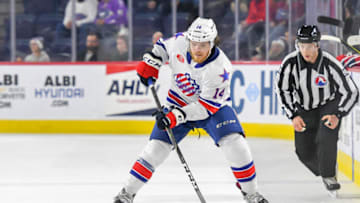 LAVAL, QC, CANADA - JANUARY 5: Sean Malone #14 of the Rochester Americans in control of the puck against the Laval Rocket at Place Bell on January 5, 2019 in Laval, Quebec. (Photo by Stephane Dube /Getty Images)