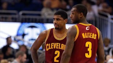 Dec 13, 2013; Orlando, FL, USA; Cleveland Cavaliers point guard Kyrie Irving (2) and shooting guard Dion Waiters (3) against the Orlando Magic during the first quarter at Amway Center. Mandatory Credit: Kim Klement-USA TODAY Sports