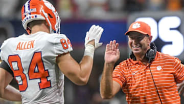 Clemson head coach Dabo Swinney high-fives tight end Davis Allen (84) during the fourth quarter at the Mercedes-Benz Stadium in Atlanta, Georgia Monday, September 5, 2022.Ncaa Fb Clemson At Georgia Tech