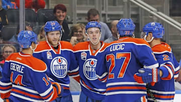 Oct 8, 2016; Edmonton, Alberta, CAN; The Edmonton Oilers celebrate a second period goal by forward Connor McDavid (97) against the Vancouver Canucks in a preseason hockey game at Rogers Place. Mandatory Credit: Perry Nelson-USA TODAY Sports