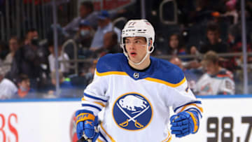 ELMONT, NEW YORK - DECEMBER 30: JJ Peterka #77 of the Buffalo Sabres skates against the New York Islanders at the UBS Arena on December 30, 2021 in Elmont, New York. (Photo by Bruce Bennett/Getty Images)