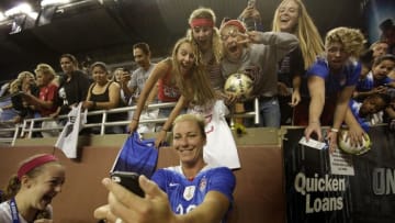 Sept 17, 2015; Detroit, MI, USA; United States forward Abby Wambach (20) takes a selfie with fans after the game against Haiti during the women