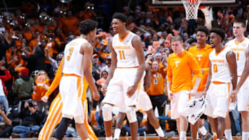 KNOXVILLE, TN - JANUARY 24: Robert Hubbs III #3 and Kyle Alexander #11 of the Tennessee Volunteers celebrate in the first half of the game against the Kentucky Wildcats at Thompson-Boling Arena on January 24, 2017 in Knoxville, Tennessee. (Photo by Joe Robbins/Getty Images)