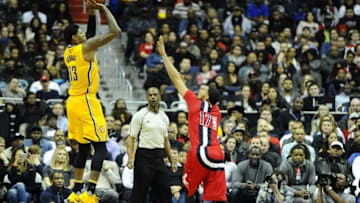 Mar 5, 2016; Washington, DC, USA; Indiana Pacers forward Paul George (13) shoots over Washington Wizards guard Garrett Temple (17) during the second half at Verizon Center. The Indiana Pacers won 100 - 99. Mandatory Credit: Brad Mills-USA TODAY Sports