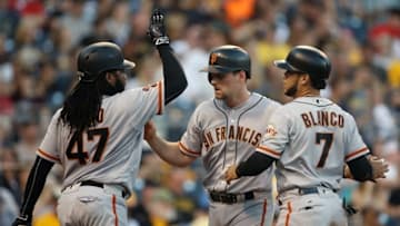 Jun 21, 2016; Pittsburgh, PA, USA; San Francisco Giants starting pitcher Johnny Cueto (47) and right fielder Gregor Blanco (7) congratulate third baseman Conor Gillaspie (middle) on his two run home run against the Pittsburgh Pirates during the fourth inning at PNC Park. Mandatory Credit: Charles LeClaire-USA TODAY Sports