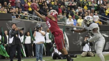 Oct 10, 2015; Eugene, OR, USA; Washington State University Cougars wide receiver Gabe Marks Jr. (9) catches a touchdown pass during the second quarter in a game against the University of Oregon Ducks at Autzen Stadium. Mandatory Credit: Troy Wayrynen-USA TODAY Sports