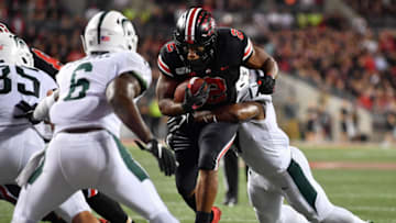 COLUMBUS, OH - OCTOBER 5: J.K. Dobbins #2 of the Ohio State Buckeyes picks up three yards near the goal line in the fourth quarter as Tyriq Thompson #17 of the Michigan State Spartans holds on for the tackle at Ohio Stadium on October 5, 2019 in Columbus, Ohio. Ohio State defeated Michigan State 34-10. (Photo by Jamie Sabau/Getty Images)