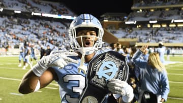 Oct 16, 2021; Chapel Hill, North Carolina, USA; North Carolina Tar Heels linebacker Cedric Gray (33) celebrates after the game at Kenan Memorial Stadium. Gray intercepted the ball in the last minute to seal the victory. Mandatory Credit: Bob Donnan-USA TODAY Sports