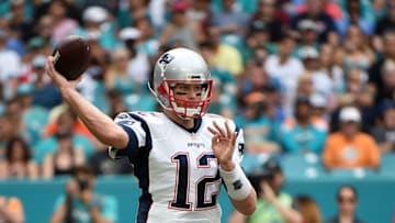 Jan 1, 2017; Miami Gardens, FL, USA; New England Patriots quarterback Tom Brady (12) throws a pass against the Miami Dolphins during the first half at Hard Rock Stadium. Mandatory Credit: Steve Mitchell-USA TODAY Sports