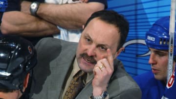 WASHINGTON - JANUARY 26: Head Coach Bryan Trottier of the New York Rangers argues with the referee during the NHL game against the Washington Capitals at MCI Center on January 26, 2003 in Washington, DC. The Capitals defeated the Rangers 7-2. (Photo By Mitchell Layton/Getty Images/NHLI)