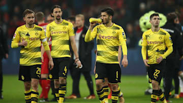 LEVERKUSEN, GERMANY - DECEMBER 02: (L-R:) Marcel Schmelzer of Dortmund, Neven Subotic of Dortmund, Nuri Sahin of Dortmund and Christian Pulisic of Dortmund walk off the pitch after the Bundesliga match between Bayer 04 Leverkusen and Borussia Dortmund at BayArena on December 2, 2017 in Leverkusen, Germany. (Photo by Alex Grimm/Bongarts/Getty Images)