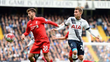 LONDON, ENGLAND - OCTOBER 17: Adam Lallana of Liverpool and Christian Eriksen of Tottenham Hotspur compete for the ball during the Barclays Premier League match between Tottenham Hotspur and Liverpool at White Hart Lane on October 17, 2015 in London, England. (Photo by Michael Regan/Getty Images)