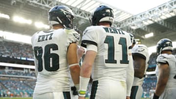 MIAMI, FLORIDA - DECEMBER 01: Zach Ertz #86 of the Philadelphia Eagles talks with Carson Wentz #11 against the Miami Dolphins during the fourth quarter at Hard Rock Stadium on December 01, 2019 in Miami, Florida. (Photo by Michael Reaves/Getty Images)