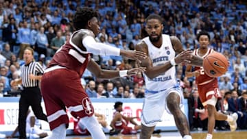 CHAPEL HILL, NORTH CAROLINA - NOVEMBER 12: Seventh Woods #0 of the North Carolina Tar Heels drives against KZ Okpala #0 of the Stanford Cardinal during the second half of their game at the Dean Smith Center on November 12, 2018 in Chapel Hill, North Carolina. North Carolina won 90-72 (Photo by Grant Halverson/Getty Images)