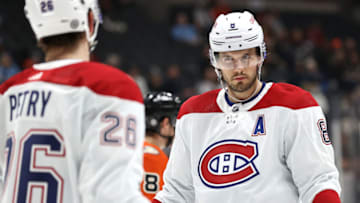 ANAHEIM, CALIFORNIA - OCTOBER 31: Ben Chiarot with Jeff Petry (Photo by Sean M. Haffey/Getty Images)