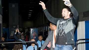 WASHINGTON, DC - JANUARY 28: WWE Wrestler Roman Reigns signs autographs during the Washington Auto Show at the Washington Convention Center in Washington DC on January 28, 2016. (Kris Connor/Getty Images)