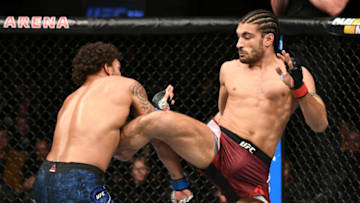 TORONTO, CANADA - DECEMBER 08: (R-L) Elias Theodorou of Canada kicks Eryk Anders in their middleweight fight during the UFC 231 event at Scotiabank Arena on December 8, 2018 in Toronto, Canada. (Photo by Josh Hedges/Zuffa LLC/Zuffa LLC via Getty Images)