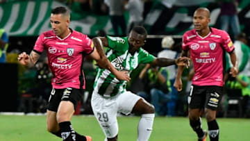 MEDELLIN, COLOMBIA - JULY 27: Marlos Moreno (R) of Atletico Nacional vies for the ball with Christian Nuñez (L) of Independiente del Valle during a second leg final match between Atletico Nacional and Independiente del Valle as part of Copa Bridgestone Libertadores 2016 at Atanasio Girardot Stadium on July 27, 2016 in Medellin, Colombia. (Photo by Gabriel Aponte/LatinContent/Getty Images)