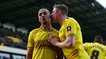 OXFORD, ENGLAND - JANUARY 10: Kemar Roofe (L) of Oxford United is congratulated by Liam Sercombe of Oxford United after scoring hois team's third goal during The Emirates FA Cup third round match between Oxford United and Swansea City at the Kassam Stadium on January 10, 2016 in Oxford, England. (Photo by Michael Steele/Getty Images)