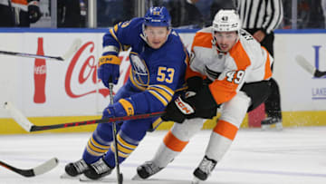 BUFFALO, NEW YORK - SEPTEMBER 27: Jeff Skinner #53 of the Buffalo Sabres and Noah Cates #49 of the Philadelphia Flyers skate after the puck during the third period at KeyBank Center on September 27, 2022 in Buffalo, New York. (Photo by Joshua Bessex/Getty Images)