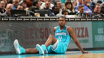 CHARLOTTE, NC - DECEMBER 23: Treveon Graham #21 of the Charlotte Hornets waits to get in the game against the Milwaukee Bucks on December 23, 2017 at the Spectrum Center in Charlotte, North Carolina. NOTE TO USER: User expressly acknowledges and agrees that, by downloading and or using this photograph, User is consenting to the terms and conditions of the Getty Images License Agreement. Mandatory Copyright Notice: Copyright 2017 NBAE (Photo by Kent Smith/NBAE via Getty Images)