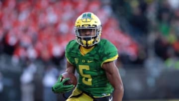 Nov 27, 2015; Eugene, OR, USA; Oregon Ducks running back Taj Griffin (5) runs the ball against the Oregon State Beavers at Autzen Stadium. Mandatory Credit: Scott Olmos-USA TODAY Sports