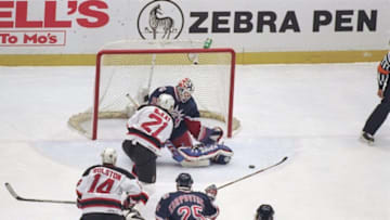 11 May 1997: Goaltender Mike Richter of the New York Rangers tries to stop the shot of Randy McKay of the New Jersey Devils during a playoff game at the Continental Airlines Arena in East Rutherford, New Jersey. The Rangers won the game 2-1. Mandatory C
