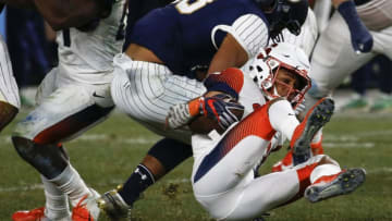 NEW YORK, NY - NOVEMBER 17: Paul Moala #13 of the Notre Dame Fighting Irish takes down Sean Riley #10 of the Syracuse Orange during their game at Yankee Stadium on November 17, 2018 in New York, New York. (Photo by Jeff Zelevansky/Getty Images)