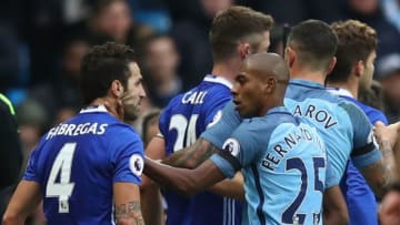 MANCHESTER, ENGLAND - DECEMBER 03: Cesc Fabregas of Chelsea and Fernandinho of Manchester City clash during the Premier League match between Manchester City and Chelsea at Etihad Stadium on December 3, 2016 in Manchester, England. (Photo by Clive Brunskill/Getty Images)