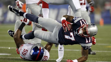 Sep 3, 2015; Foxborough, MA, USA; New York Giants linebacker Devon Kennard (59) tackles New England Patriots wide receiver Aaron Dobson (17) during the first quarter at Gillette Stadium. Mandatory Credit: Stew Milne-USA TODAY Sports