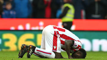 STOKE ON TRENT, ENGLAND - JANUARY 20: Mame Biram Diouf of Stoke City celebrates after scoring his sidessecond goal during the Premier League match between Stoke City and Huddersfield Town at Bet365 Stadium on January 20, 2018 in Stoke on Trent, England. (Photo by Alex Morton/Getty Images)
