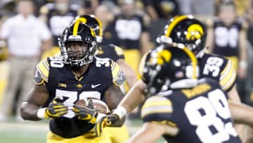 IOWA CITY, IOWA- SEPTEMBER 15: Runningback Henry Geil #30 of the Iowa Hawkeyes runs up the field during the second half against the Northern Iowa Panthers on September 15, 2018 at Kinnick Stadium, in Iowa City, Iowa. (Photo by Matthew Holst/Getty Images)