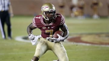 Sep 5, 2015; Tallahassee, FL, USA; Florida State player Mario Pender (7) picks up a Florida State first down against the Texas State Bobcats at Doak Campbell Stadium. Mandatory Credit: Glenn Beil-USA TODAY Sports