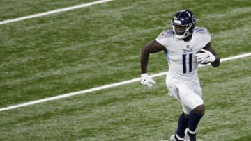 INDIANAPOLIS, INDIANA - NOVEMBER 29: A.J. Brown #11 of the Tennessee Titans carries the ball for a touchdown in the first quarter during their game against the Indianapolis Colts at Lucas Oil Stadium on November 29, 2020 in Indianapolis, Indiana. (Photo by Michael Hickey/Getty Images)