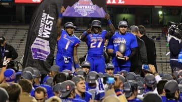 Dec 6, 2014; Boise, ID, USA; Boise State Broncos cornerback Bryan Douglas (1) running back Jay Ajayi (27) and linebacker Tanner Vallejo (20) celebrate Boise State