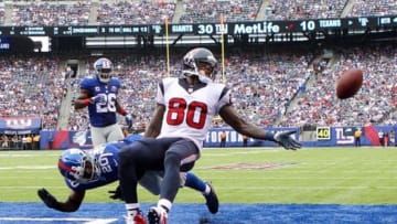 Sep 21, 2014; East Rutherford, NJ, USA; New York Giants cornerback Prince Amukamara (20) commits pass interference on a pass intended for Houston Texans wide receiver Andre Johnson (80) during the fourth quarter at MetLife Stadium. Mandatory Credit: Brad Penner-USA TODAY Sports