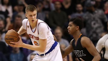PHOENIX, AZ - DECEMBER 13: Kristaps Porzingis #6 of the New York Knicks handles the ball against Marquese Chriss #0 of the Phoenix Suns during the second half of the NBA game at Talking Stick Resort Arena on December 13, 2016 in Phoenix, Arizona. The Suns defeated the Knicks 113-111. NOTE TO USER: User expressly acknowledges and agrees that, by downloading and or using this photograph, User is consenting to the terms and conditions of the Getty Images License Agreement. (Photo by Christian Petersen/Getty Images)