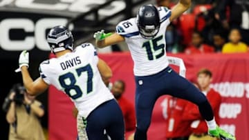 Nov 10, 2013; Atlanta, GA, USA; Seattle Seahawks wide receiver Jermaine Kearse (15) reacts with tight end Kelley Davis (87) after catching a touchdown pass against the Atlanta Falcons during the second quarter at the Georgia Dome. Mandatory Credit: Dale Zanine-USA TODAY Sports