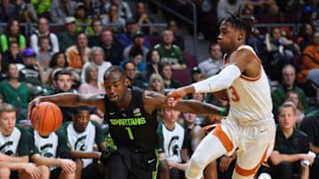 LAS VEGAS, NEVADA - NOVEMBER 23: Joshua Langford #1 of the Michigan State Spartans drives against Jase Febres #13 of the Texas Longhorns during the championship game of the 2018 Continental Tire Las Vegas Invitational basketball tournament at the Orleans Arena on November 23, 2018 in Las Vegas, Nevada. Michigan State defeated Texas 78-68. (Photo by Sam Wasson/Getty Images)