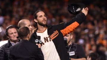 San Francisco Giants starting pitcher Madison Bumgarner waves to the crowd after defeating the Kansas City Royals during game five of the 2014 World Series at AT&T Park. Mandatory Credit: Kyle Terada-USA TODAY Sports