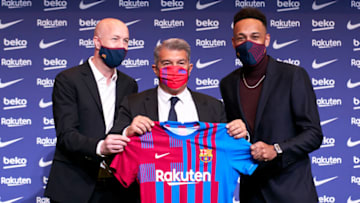 Pierre-Emerick Aubameyang, Joan Laporta, President of FC Barcelona and Jordi Cruyff. (Photo by Pedro Salado/Quality Sport Images/Getty Images)