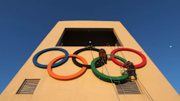 PYEONGCHANG-GUN, SOUTH KOREA - JANUARY 27: Workers make a Olympic Rings at the Alpensia Ski Jumping Centre, ahead of PyeongChang 2018 Winter Olympic Games on January 27, 2018 in Pyeongchang-gun, South Korea. (Photo by Chung Sung-Jun/Getty Images)