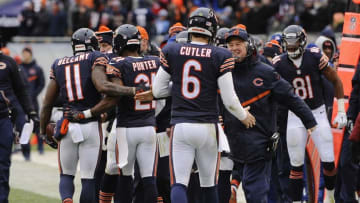 Jan 3, 2016; Chicago, IL, USA; Chicago Bears head coach John Fox high-fives Chicago Bears quarterback Jay Cutler (6) after his touchdown pass to Chicago Bears wide receiver Josh Bellamy (11) against the Detroit Lions in the second half of their game at Soldier Field. Mandatory Credit: Matt Marton-USA TODAY Sports