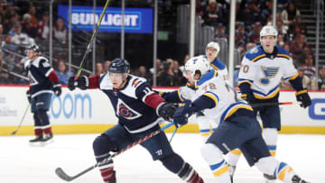 DENVER, COLORADO - JANUARY 18: Matt Calvert #11 of the Colorado Avalanche skates against Justin Faulk #72 of the St Louis Blues at Pepsi Center on January 18, 2020 in Denver, Colorado. (Photo by Michael Martin/NHLI via Getty Images)