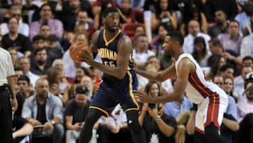 Nov 12, 2014; Miami, FL, USA; Indiana Pacers center Roy Hibbert (55) is pressured by Miami Heat forward Shawne Williams (43) during the first half at American Airlines Arena. Mandatory Credit: Steve Mitchell-USA TODAY Sports