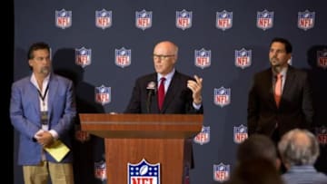 Mar 24, 2014; Orlando, FL, USA: Atlanta Falcons president & ceo Rich McKay speaks at a press conference as St. Louis Rams head coach Jeff Fisher (left) and NFL vice president of officiating Dean Blandino (right) look on during the NFL Annual Meetings. Mandatory Credit: Rob Foldy-USA TODAY Sports