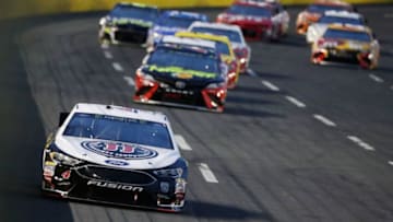 CHARLOTTE, NORTH CAROLINA - MAY 19: Kevin Harvick, driver of the #4 Jimmy John's Ford, leads a pack of cars during the Monster Energy NASCAR Cup Series All-Star Race at Charlotte Motor Speedway on May 19, 2018 in Charlotte, North Carolina. (Photo by Streeter Lecka/Getty Images)
