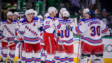 Mar 10, 2020; Dallas, Texas, USA; New York Rangers goaltender Henrik Lundqvist (30) and the Rangers celebrate the win over the Dallas Stars at the American Airlines Center. Mandatory Credit: Jerome Miron-USA TODAY Sports